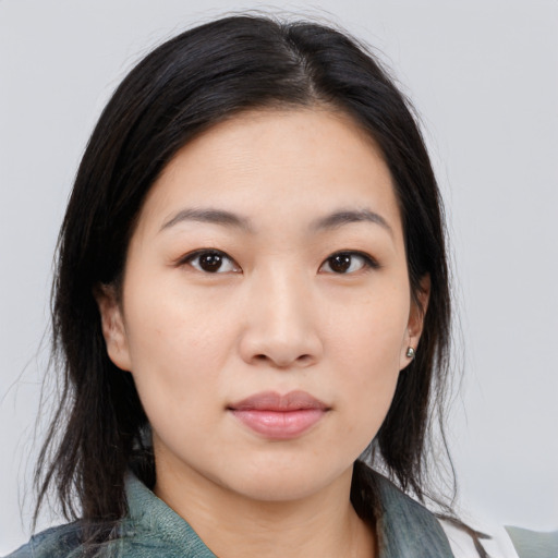 Neutral white young-adult female with medium  black hair and brown eyes