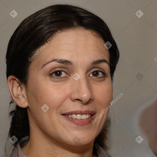 Joyful white adult female with medium  brown hair and brown eyes