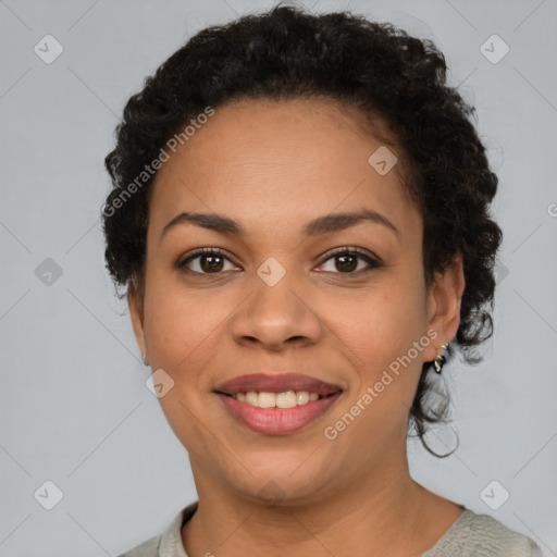 Joyful latino young-adult female with short  brown hair and brown eyes