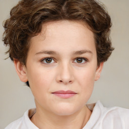 Joyful white child female with short  brown hair and brown eyes