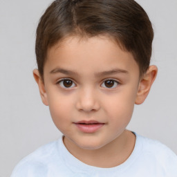 Joyful white child female with short  brown hair and brown eyes