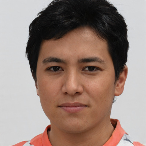 Joyful asian young-adult male with short  black hair and brown eyes
