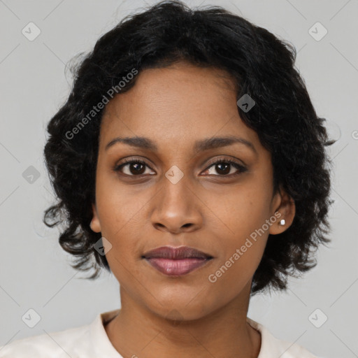 Neutral black young-adult female with medium  brown hair and brown eyes