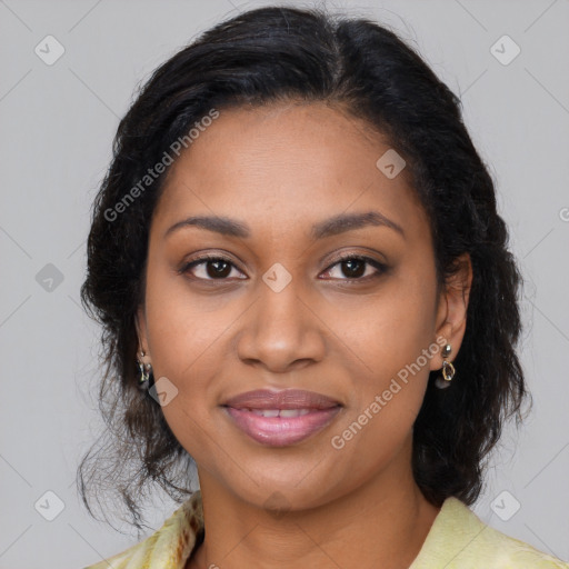 Joyful black young-adult female with medium  brown hair and brown eyes