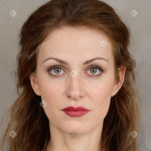 Joyful white young-adult female with long  brown hair and green eyes