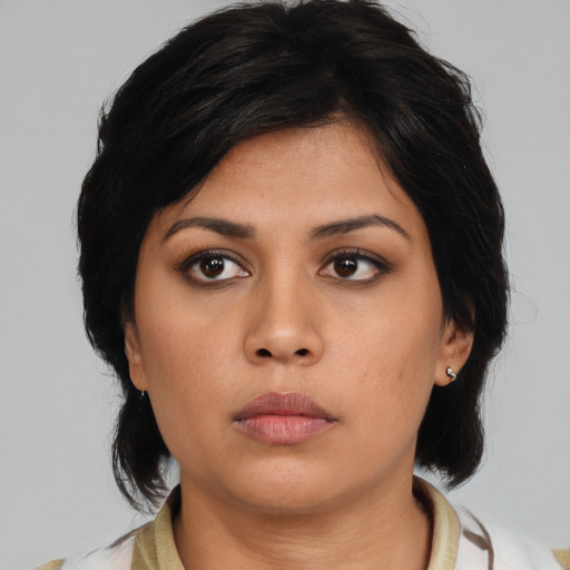 Neutral asian young-adult female with medium  black hair and brown eyes