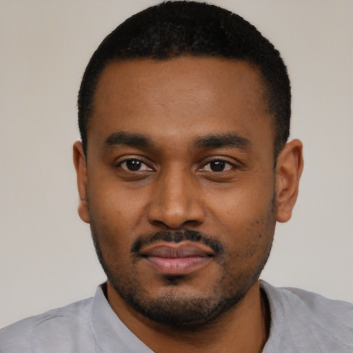 Neutral black young-adult male with short  black hair and brown eyes