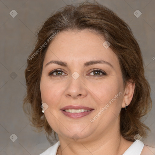 Joyful white adult female with medium  brown hair and brown eyes