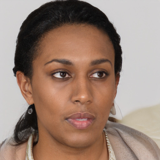 Neutral black young-adult female with short  brown hair and brown eyes