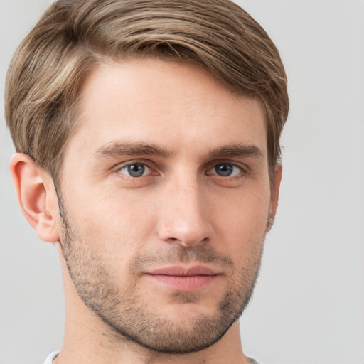 Neutral white young-adult male with short  brown hair and grey eyes