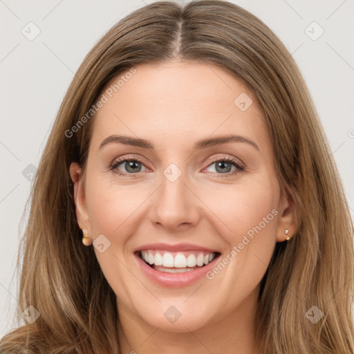 Joyful white young-adult female with long  brown hair and green eyes