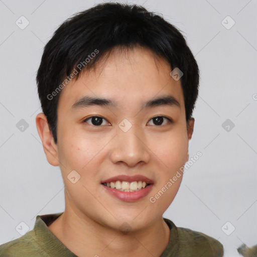 Joyful asian young-adult male with short  brown hair and brown eyes
