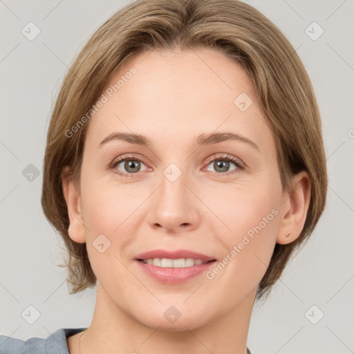 Joyful white adult female with medium  brown hair and grey eyes