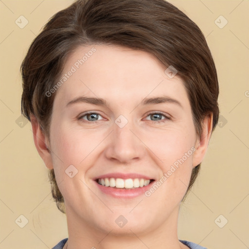 Joyful white young-adult female with medium  brown hair and grey eyes