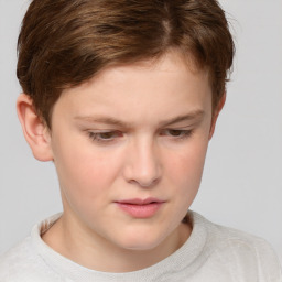 Joyful white child female with short  brown hair and brown eyes