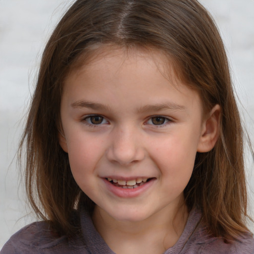 Joyful white child female with medium  brown hair and brown eyes