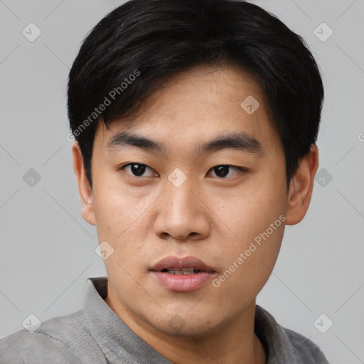 Neutral asian young-adult male with short  black hair and brown eyes