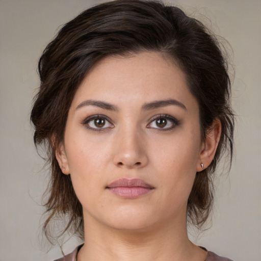 Neutral white young-adult female with medium  brown hair and brown eyes