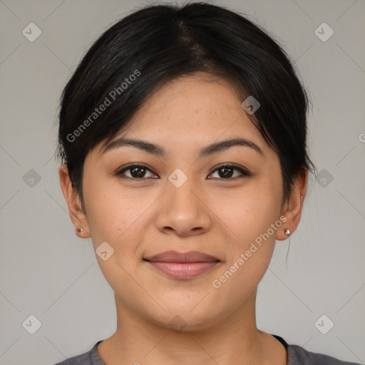 Joyful asian young-adult female with medium  black hair and brown eyes