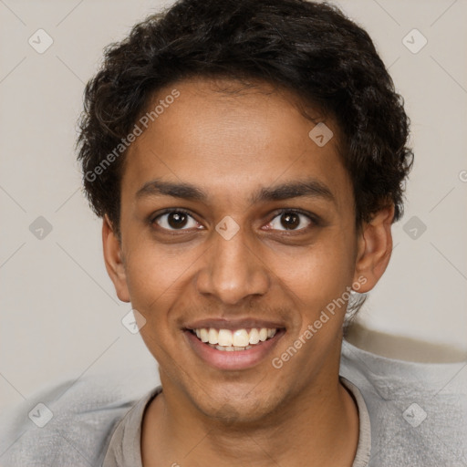 Joyful black young-adult male with short  brown hair and brown eyes