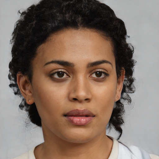 Neutral latino young-adult female with short  black hair and brown eyes