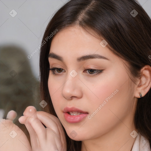 Neutral white young-adult female with long  brown hair and brown eyes