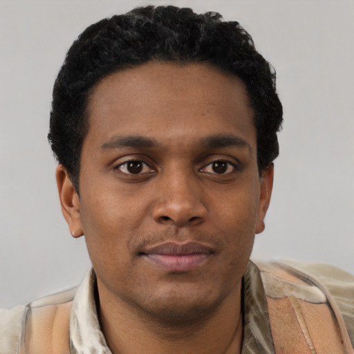 Neutral black young-adult male with short  black hair and brown eyes