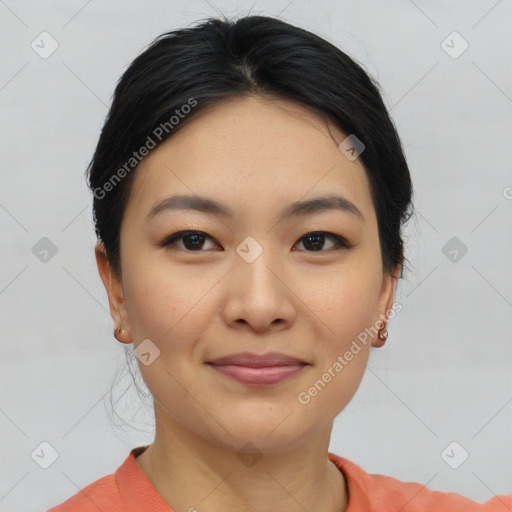 Joyful asian young-adult female with short  black hair and brown eyes