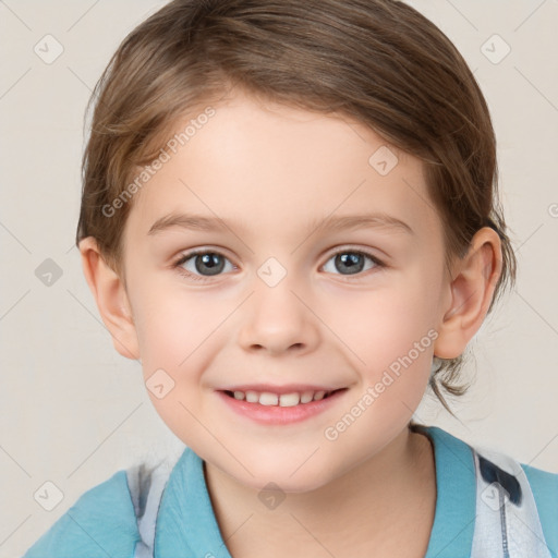 Joyful white child female with short  brown hair and grey eyes