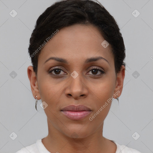 Joyful black young-adult female with short  brown hair and brown eyes