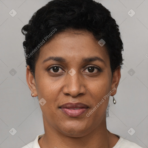 Joyful black young-adult female with short  black hair and brown eyes