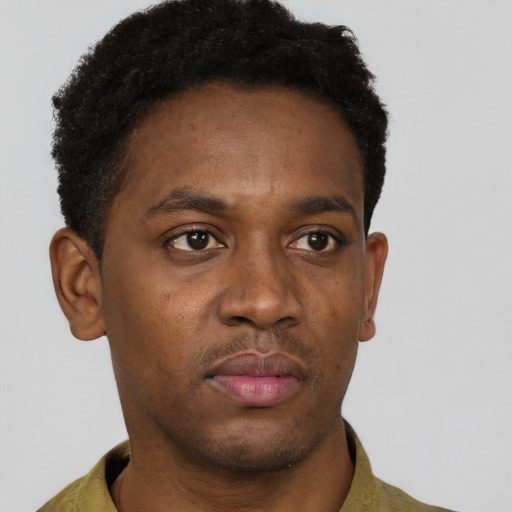 Neutral black young-adult male with short  brown hair and brown eyes