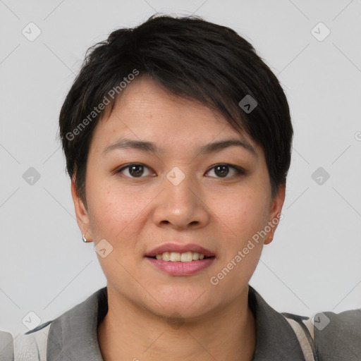 Joyful asian young-adult female with short  brown hair and brown eyes