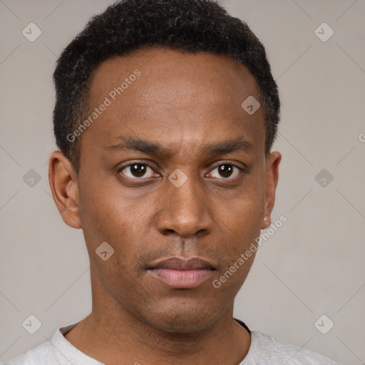 Neutral latino young-adult male with short  brown hair and brown eyes