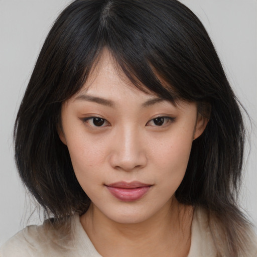 Neutral asian young-adult female with medium  brown hair and brown eyes