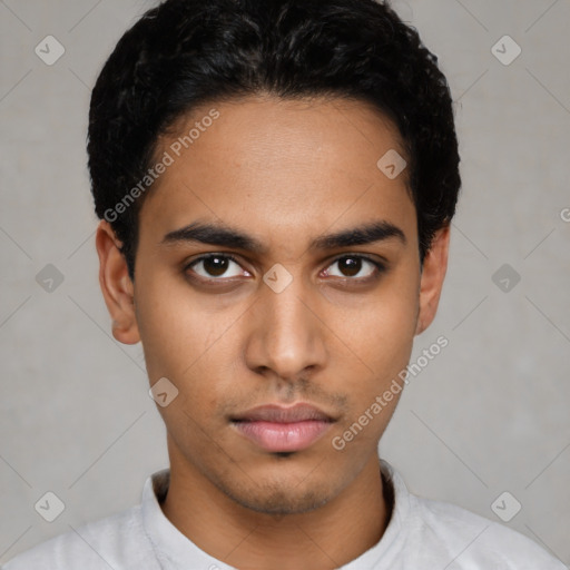 Neutral latino young-adult male with short  black hair and brown eyes