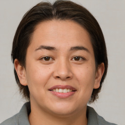 Joyful white young-adult female with medium  brown hair and brown eyes