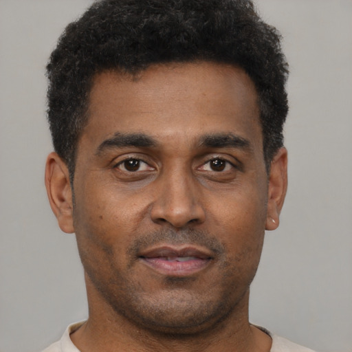 Neutral black young-adult male with short  black hair and brown eyes