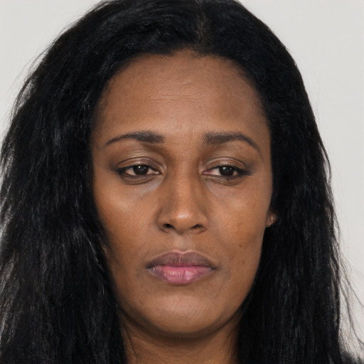 Joyful asian adult female with long  black hair and brown eyes
