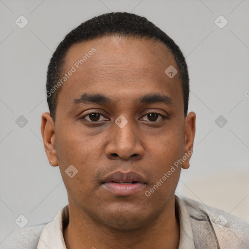 Neutral latino young-adult male with short  black hair and brown eyes