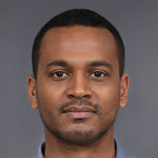 Neutral black young-adult male with short  brown hair and brown eyes