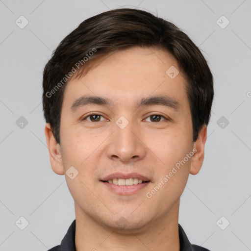 Joyful white young-adult male with short  black hair and brown eyes