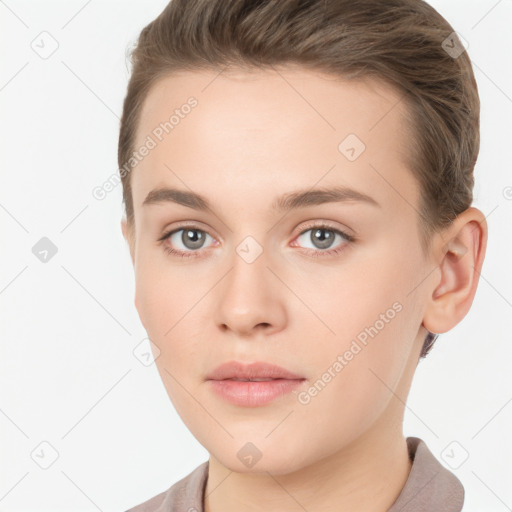 Neutral white young-adult female with short  brown hair and brown eyes