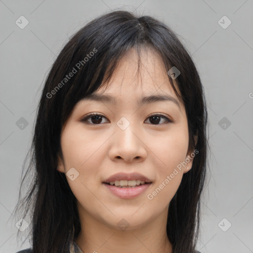 Joyful asian young-adult female with long  brown hair and brown eyes