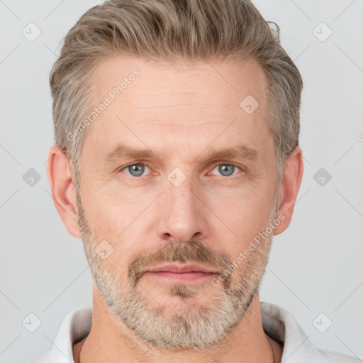 Neutral white adult male with short  brown hair and grey eyes