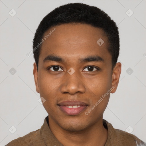 Joyful black young-adult male with short  black hair and brown eyes