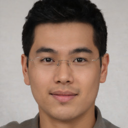 Neutral asian young-adult male with short  brown hair and brown eyes