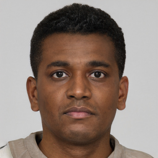 Neutral black young-adult male with short  brown hair and brown eyes