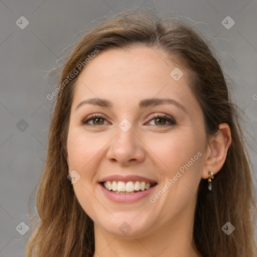 Joyful white young-adult female with long  brown hair and grey eyes