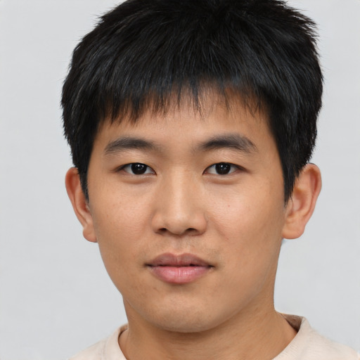 Neutral asian young-adult male with short  black hair and brown eyes